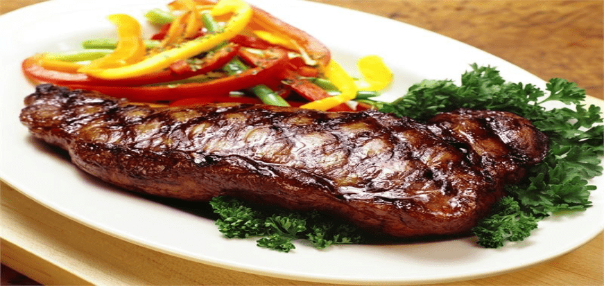 Shell Steak with Cherry Peppers and Beer Sauce